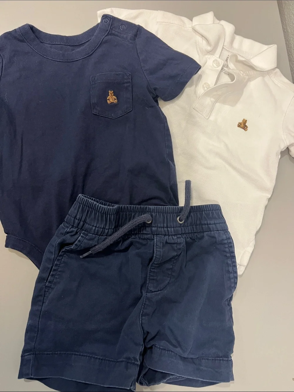 Gap Lot - A collared shirt, onesie, and shorts from Gap